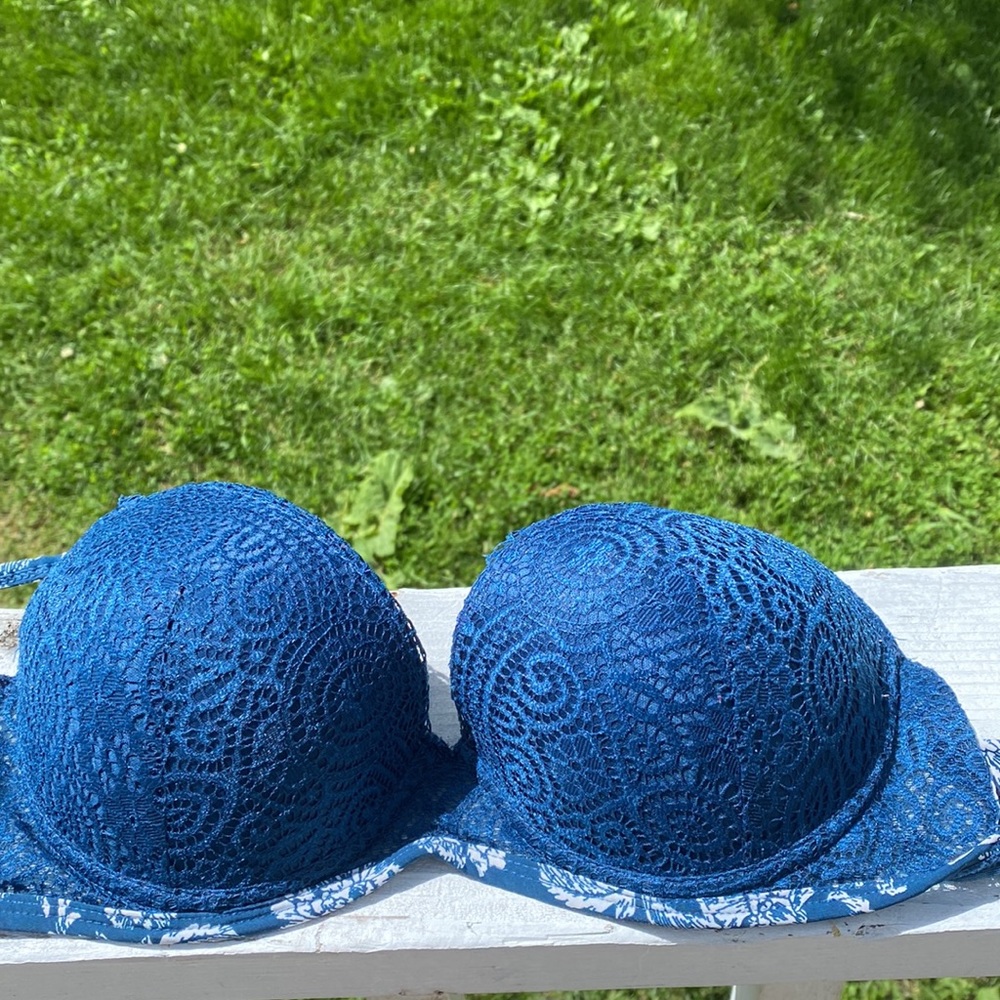 Lucky blue and cream colored lace bras